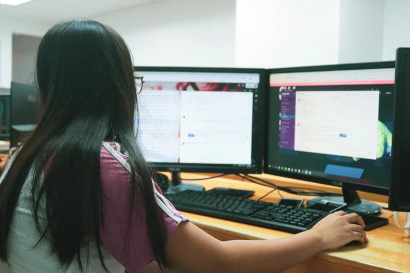 woman checking her mailbox - Shared Inbox Management