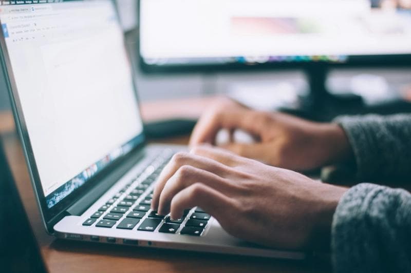 person working on laptop - Inbox Zero Method